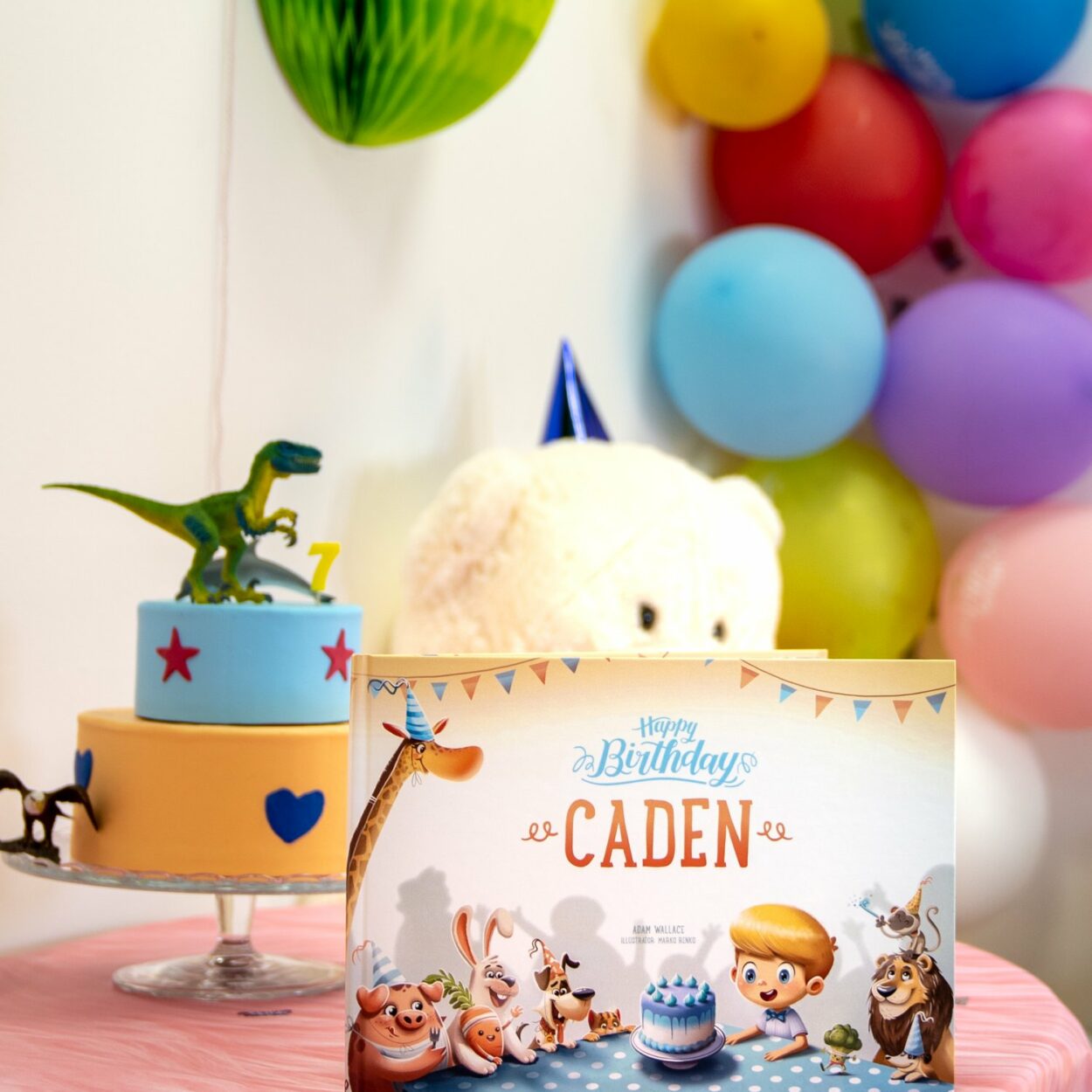 A birthday party with balloons and a personalised birthday book for kids.