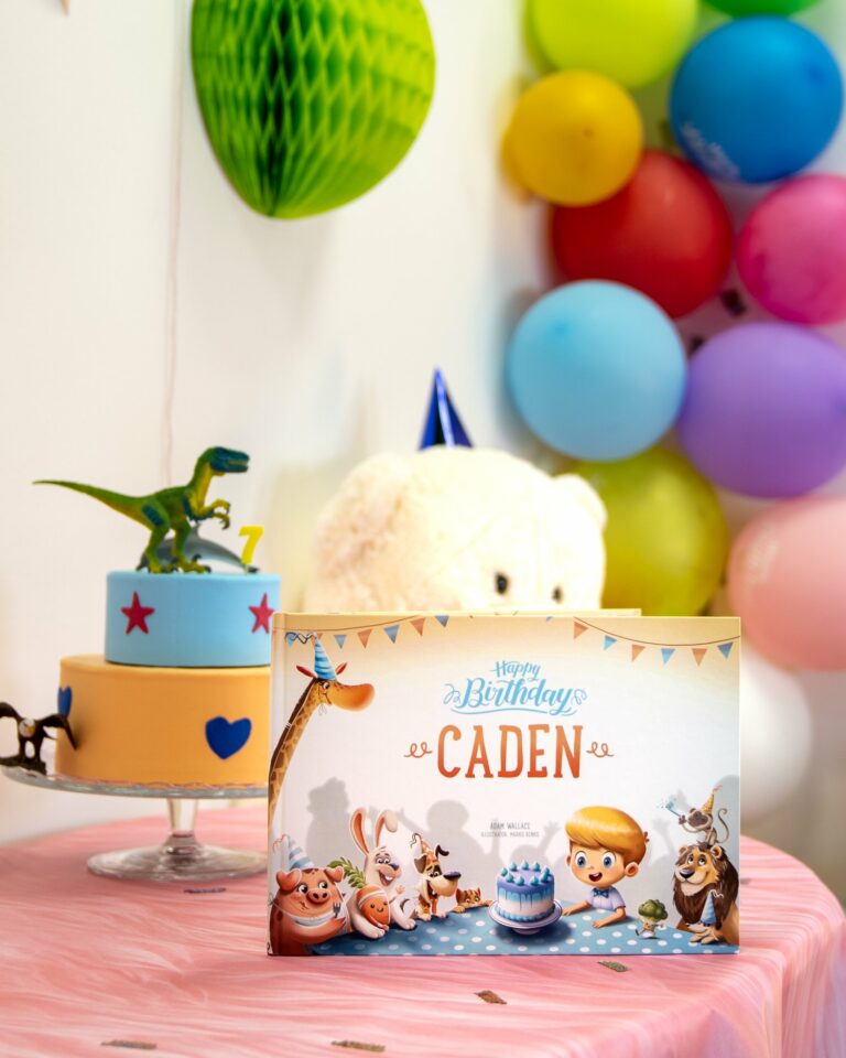 A birthday party with balloons and a personalised birthday book for kids.